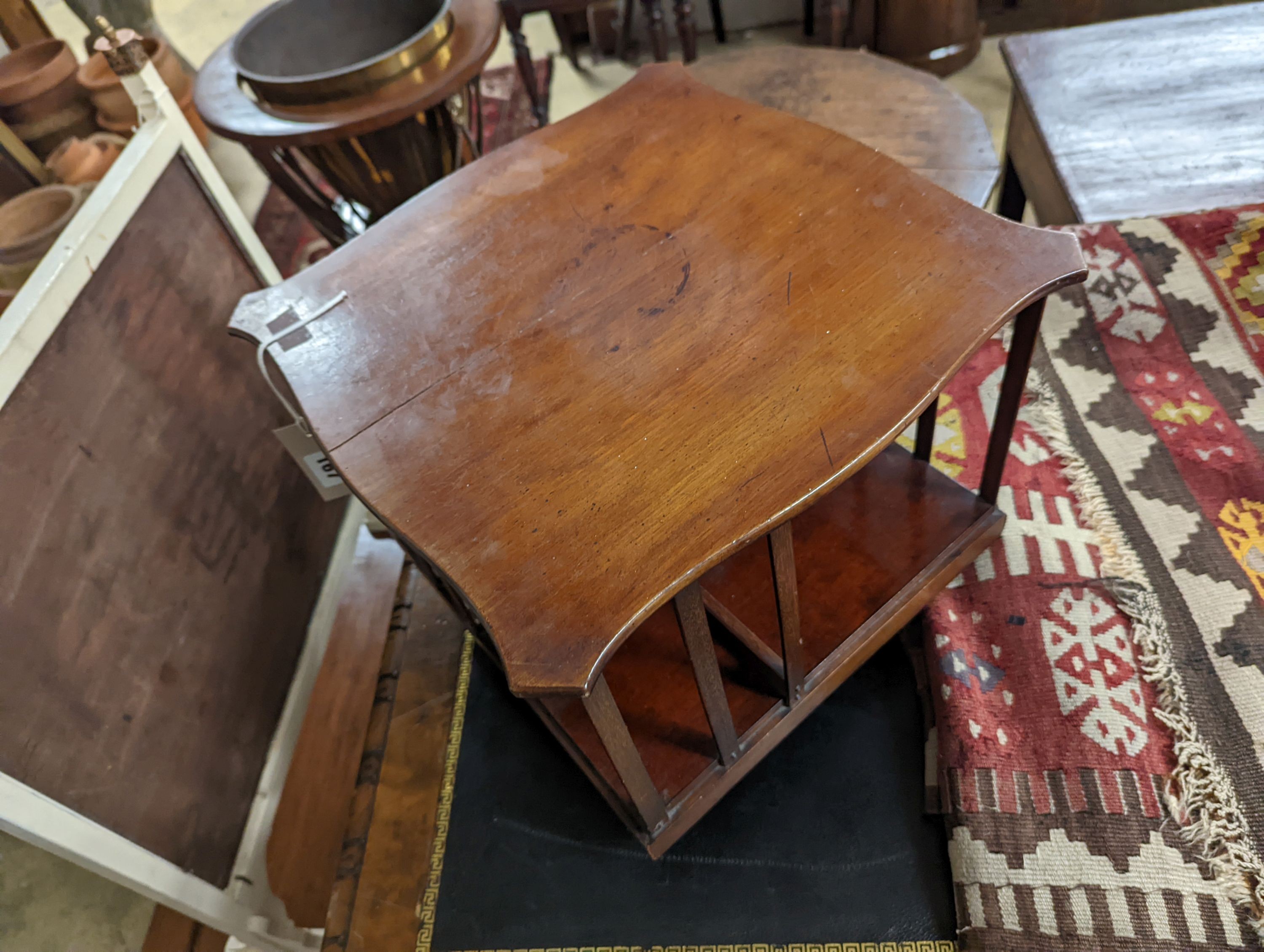 A late Victorian table top revolving bookcase, width 37cm, height 32cm